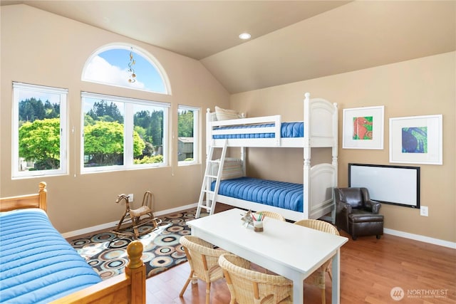bedroom featuring recessed lighting, baseboards, vaulted ceiling, and light wood-style floors