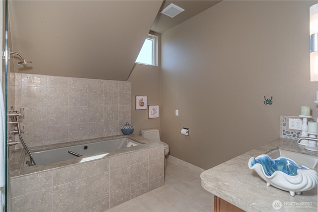 bathroom with a bath, visible vents, a sink, tile patterned floors, and toilet