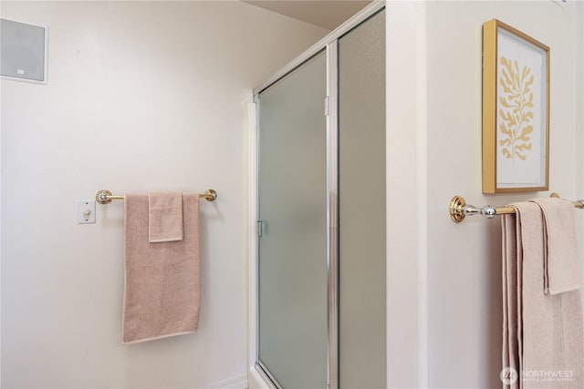 bathroom with a shower stall