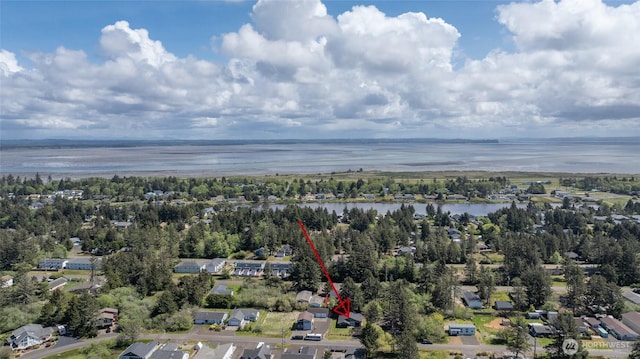 554 Puffin Ave NE, Ocean Shores, WA 98569 - bird's eye view featuring a water view and a residential view