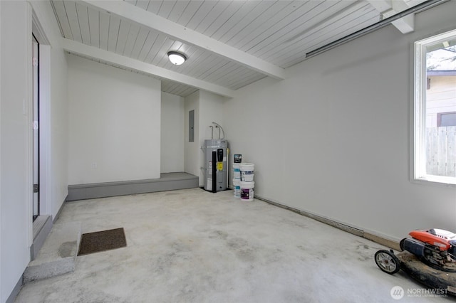 554 Puffin Ave NE, Ocean Shores, WA 98569 - garage featuring electric panel and water heater