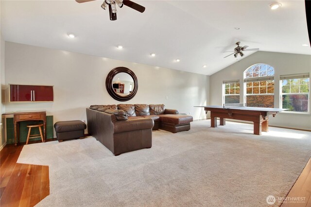living room with ceiling fan, vaulted ceiling, billiards, and wood finished floors