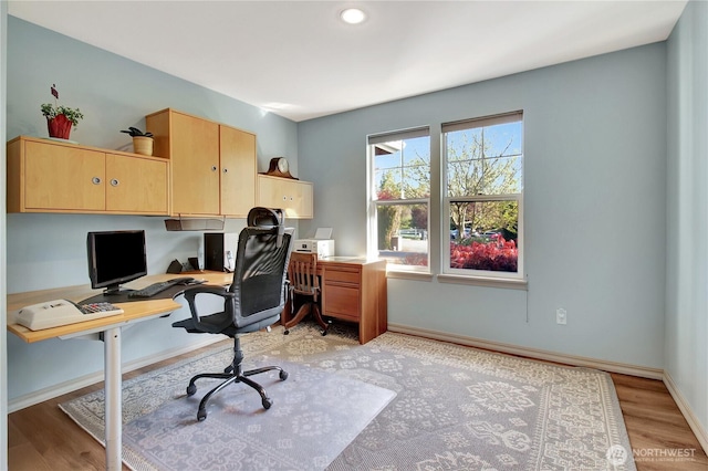office area featuring light wood-style flooring, baseboards, and recessed lighting