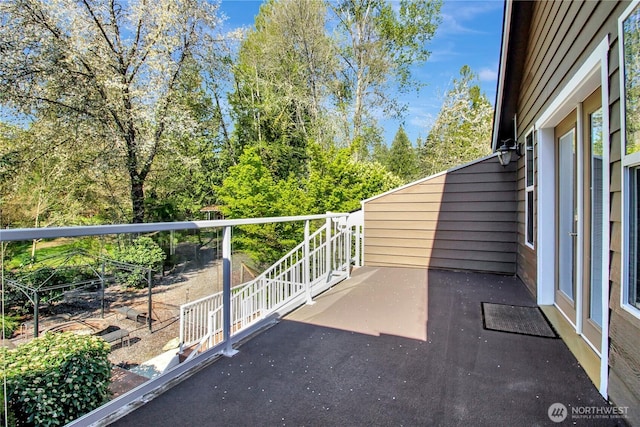 view of patio / terrace with a balcony
