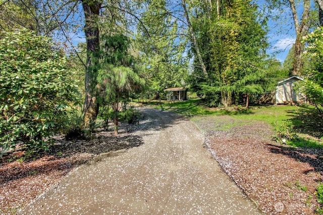 view of road with driveway