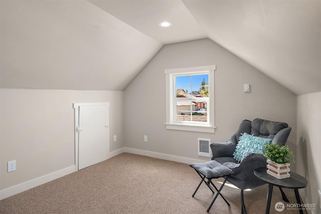 living area featuring visible vents, lofted ceiling, baseboards, recessed lighting, and carpet flooring