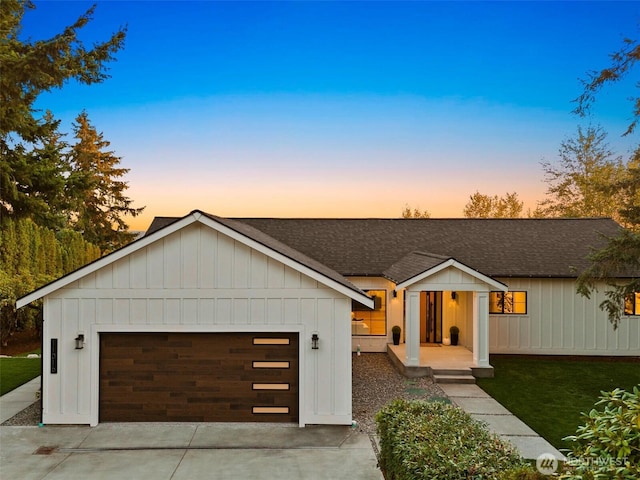 11016 46th St E, Edgewood, WA 98372 - modern inspired farmhouse featuring a shingled roof, driveway, board and batten siding, and a yard