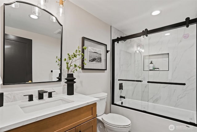11016 46th St E, Edgewood, WA 98372 - full bathroom with vanity, toilet, combined bath / shower with glass door, and recessed lighting