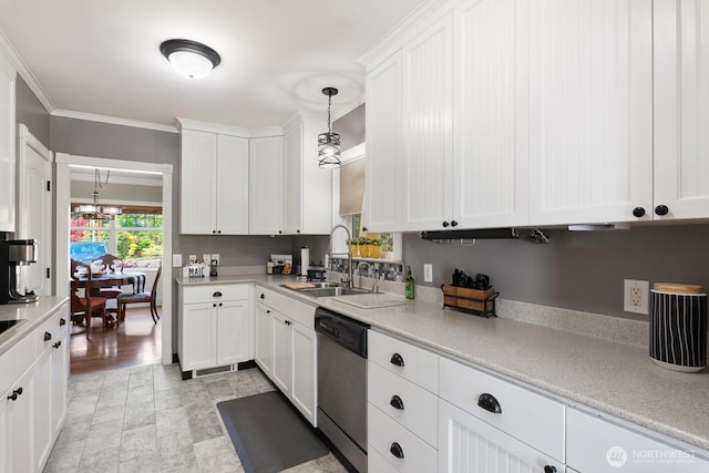 kitchen featuring crown molding, light countertops, white cabinetry, a sink, and dishwasher