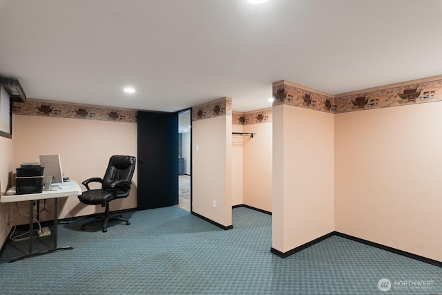 carpeted home office with baseboards
