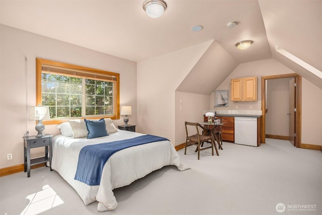 bedroom featuring baseboards, light carpet, and lofted ceiling