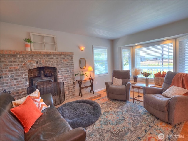 living room featuring baseboards and wood finished floors
