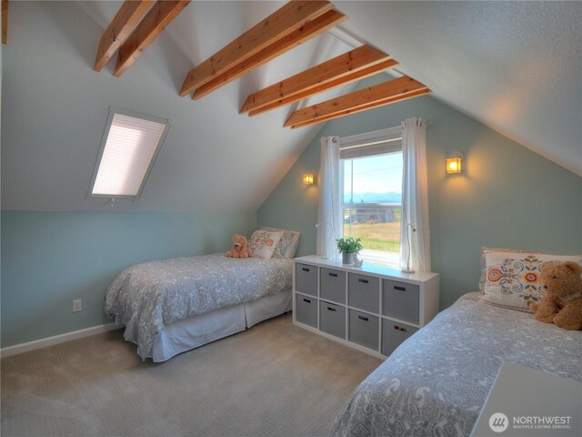 bedroom featuring vaulted ceiling with beams and carpet