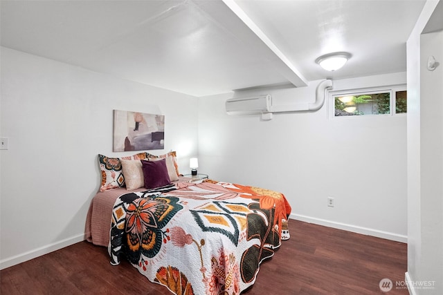 13600 Hillcrest St NW, Poulsbo, WA 98370 - bedroom featuring a wall mounted AC and wood finished floors