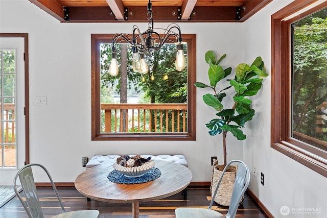 13600 Hillcrest St NW, Poulsbo, WA 98370 - dining room featuring breakfast area, a chandelier, beam ceiling, and wood finished floors