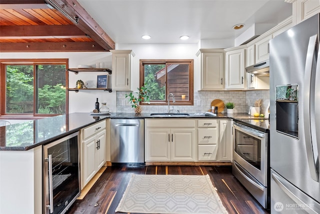 13600 Hillcrest St NW, Poulsbo, WA 98370 - kitchen with appliances with stainless steel finishes, wine cooler, dark wood-style floors, open shelves, and a wooden ceiling with exposed beams
