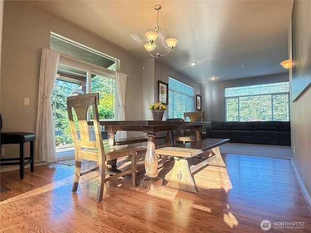 168 Jackson Rd, Orcas Island, WA 98245 - dining area featuring wood finished floors, healthy amount of natural light, a chandelier, baseboards, and recessed lighting