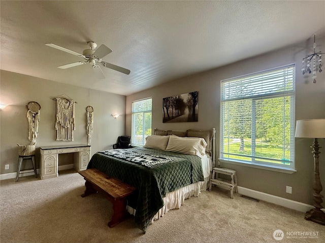 168 Jackson Rd, Orcas Island, WA 98245 - carpeted bedroom featuring baseboards, a ceiling fan, and a textured ceiling
