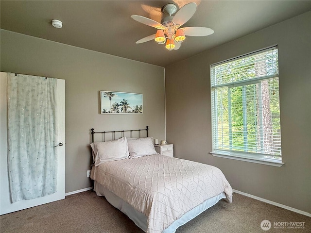 168 Jackson Rd, Orcas Island, WA 98245 - bedroom with carpet, baseboards, and a ceiling fan