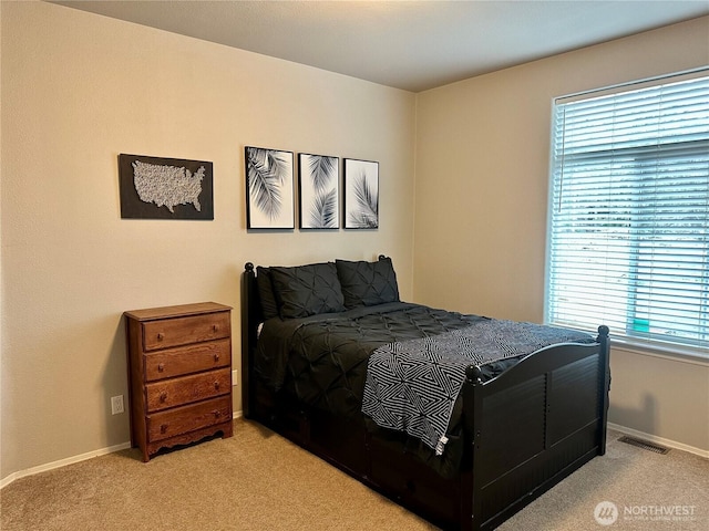 168 Jackson Rd, Orcas Island, WA 98245 - carpeted bedroom featuring multiple windows and baseboards