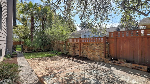 view of patio with a fenced backyard