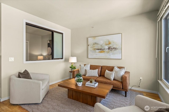 76 Cedar St Unit Ph07, Seattle, WA 98121 - living room featuring wood finished floors and baseboards