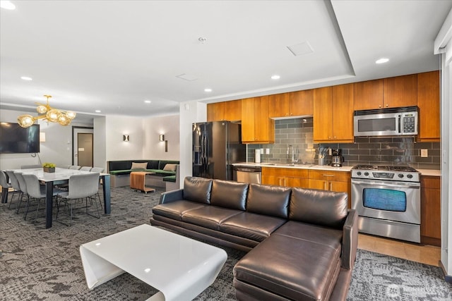 76 Cedar St Unit Ph07, Seattle, WA 98121 - living area with a chandelier and recessed lighting