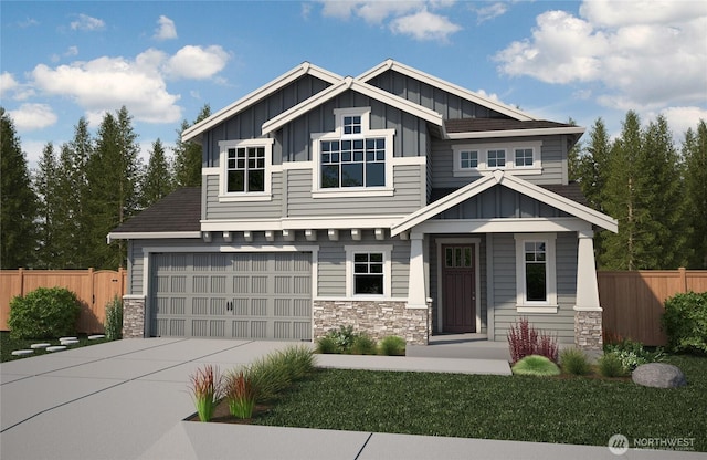 craftsman house with concrete driveway, stone siding, board and batten siding, and fence