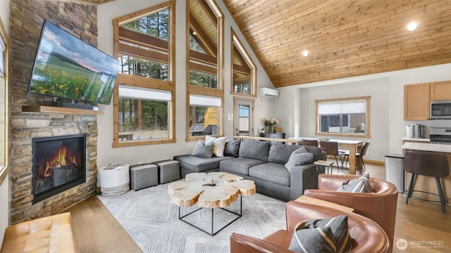 living area with a wall mounted air conditioner, a fireplace, high vaulted ceiling, wood finished floors, and wood ceiling