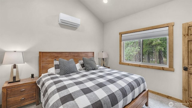 bedroom with light colored carpet, baseboards, a wall unit AC, and vaulted ceiling