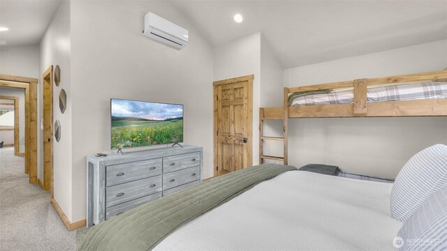 bedroom featuring recessed lighting, baseboards, a wall mounted AC, and carpet