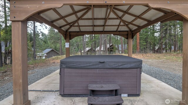 view of patio with a gazebo and a hot tub