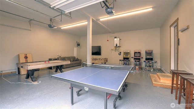 rec room with a garage and speckled floor