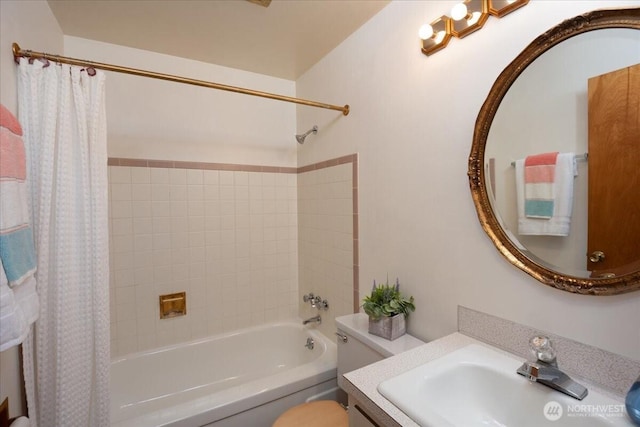 full bathroom featuring shower / tub combo, toilet, and vanity