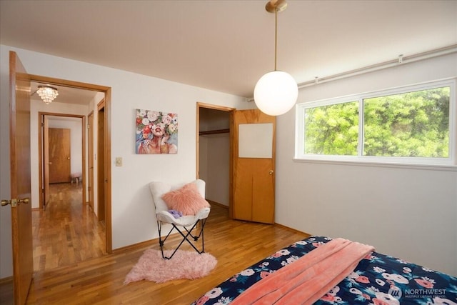 bedroom featuring light wood-style floors