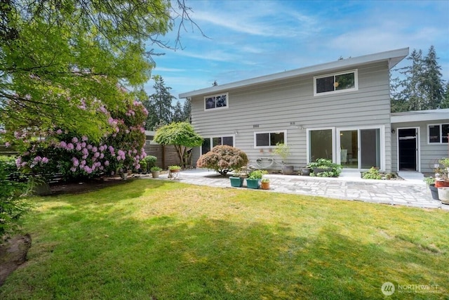 rear view of property with a patio