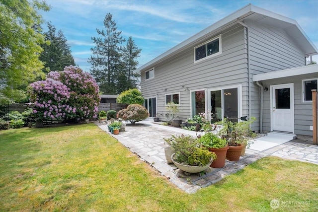 back of house featuring a patio