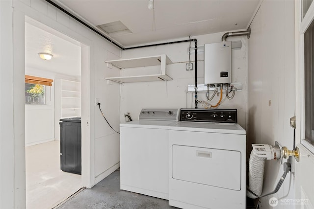 406 S Chestnut St, Ellensburg, WA 98926 - laundry room with water heater, washing machine and clothes dryer, and laundry area