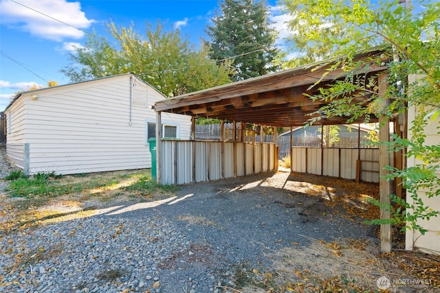 406 S Chestnut St, Ellensburg, WA 98926 - view of parking / parking lot with fence, driveway, and a carport