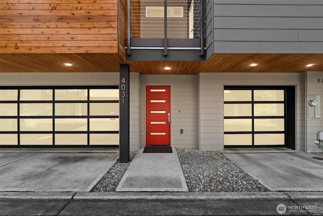 entrance to property featuring a garage