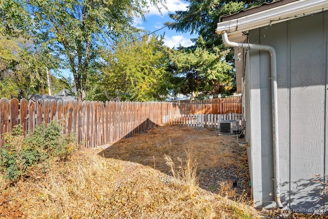 801 E Manitoba Ave, Ellensburg, WA 98926 - view of yard featuring a fenced backyard and central AC unit