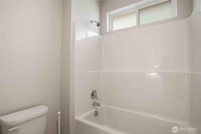 full bath with bathtub / shower combination and toilet