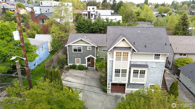 view of front of property featuring fence and a residential view