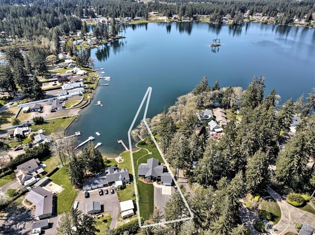 bird's eye view with a residential view, a forest view, and a water view