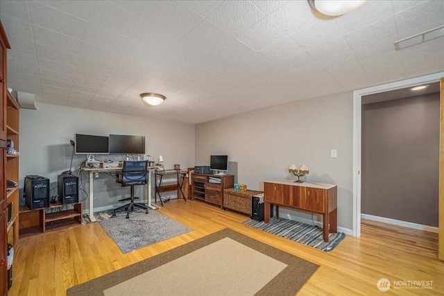 5015 SW Prince St, Seattle, WA 98116 - home office featuring wood finished floors and baseboards
