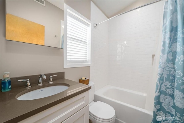 5015 SW Prince St, Seattle, WA 98116 - bathroom with vanity, toilet, and shower / bath combo with shower curtain