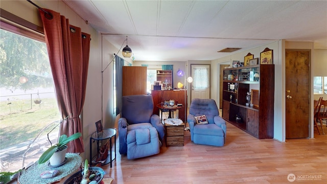 sitting room with wood finished floors