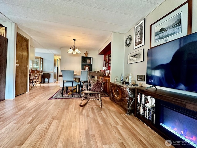 4317 Hamilton Dr, Oak Harbor, WA 98277 - dining room featuring wood finished floors and a chandelier