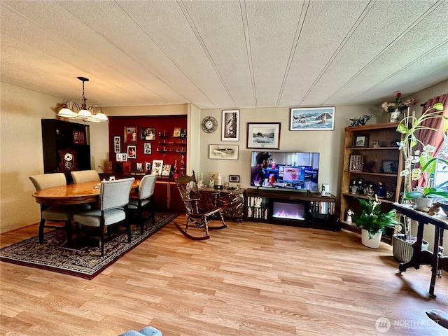 4317 Hamilton Dr, Oak Harbor, WA 98277 - dining area featuring light wood-style floors and a chandelier