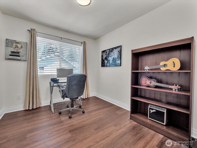 office area with baseboards, dark wood-style floors, and visible vents